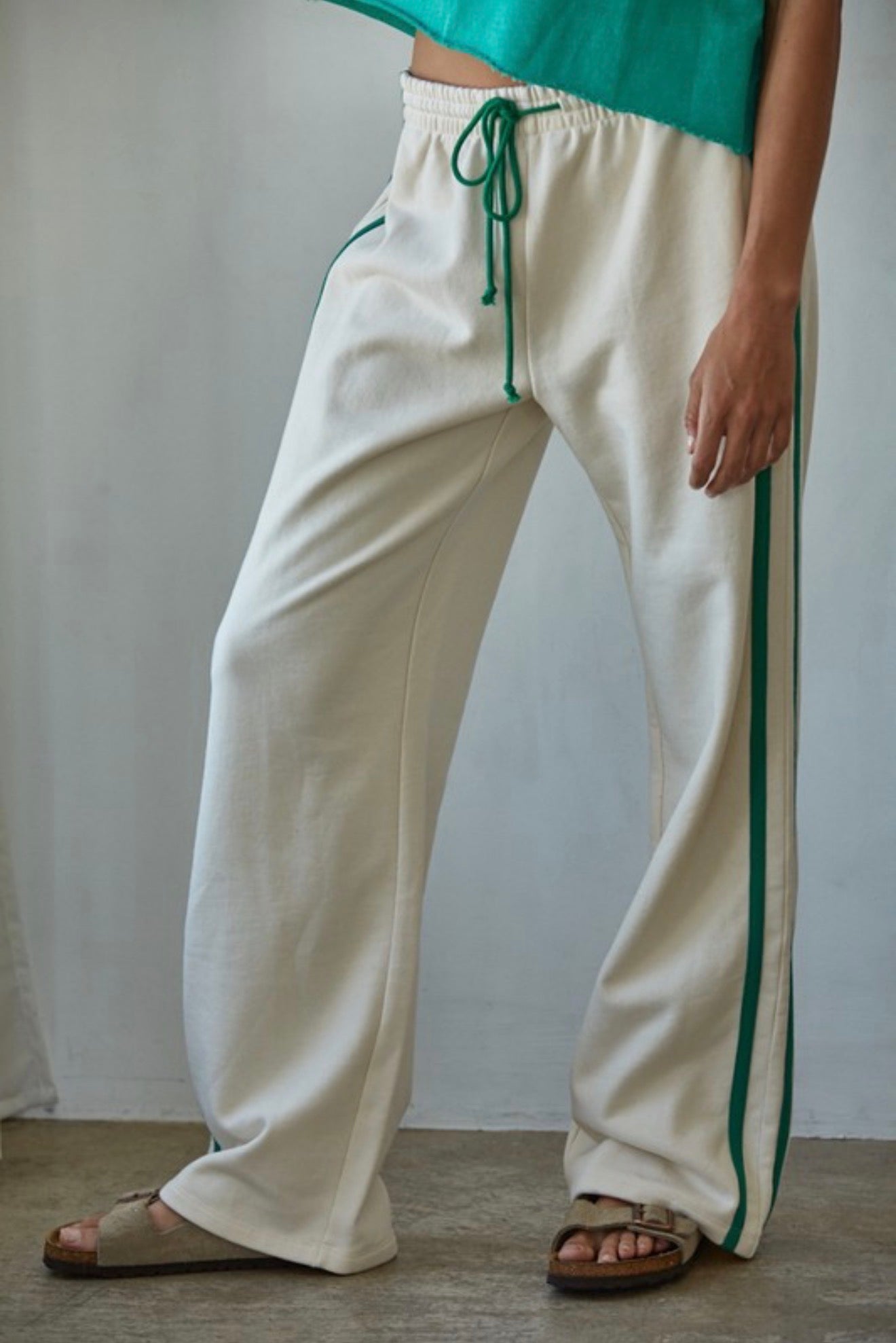 Green strip pants